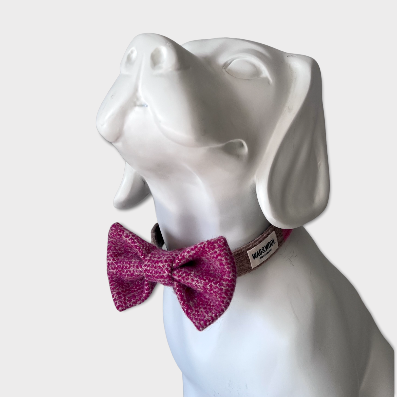 Raspberry Woven Dog Bow Tie on a mannequin