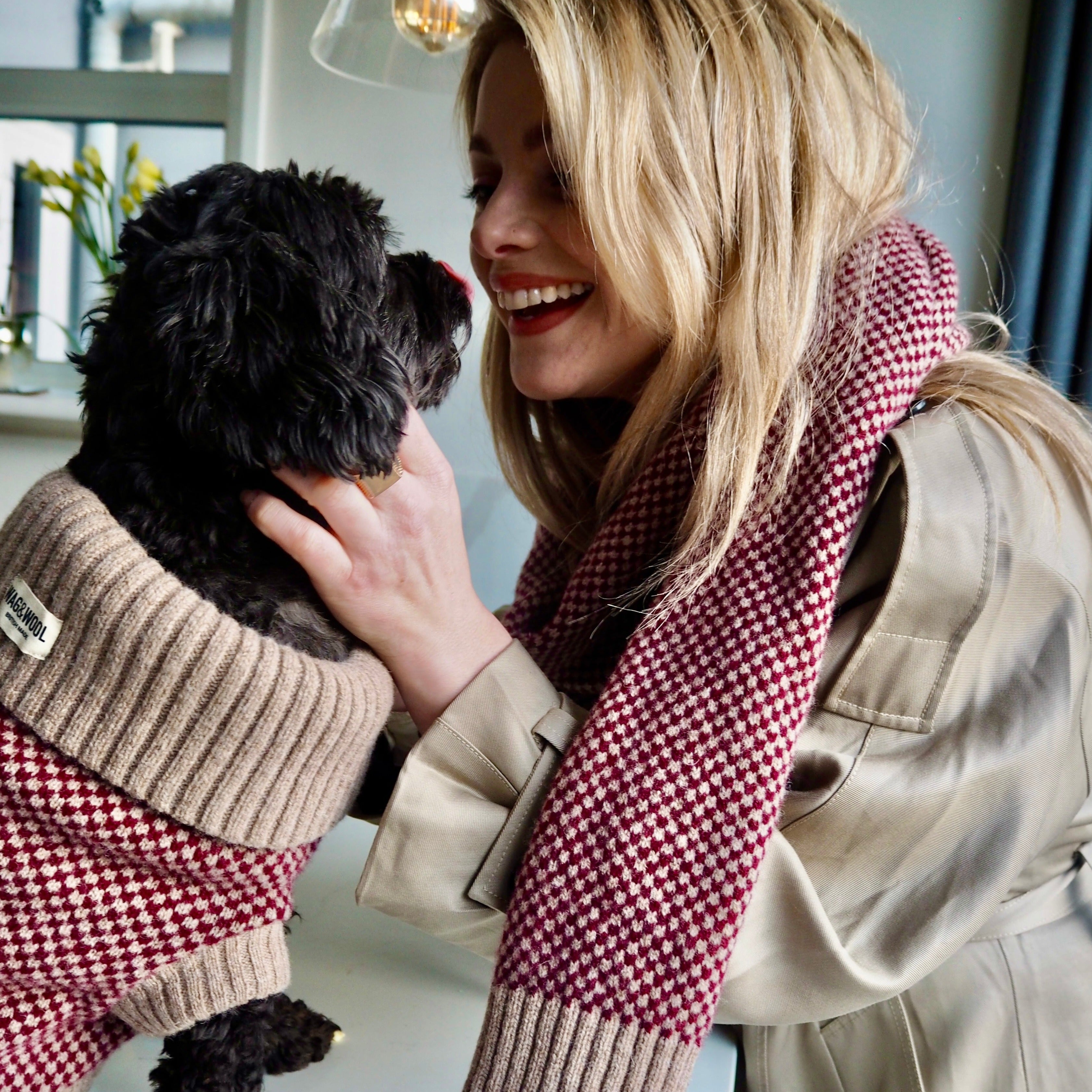 lady and a dog in matching accessories 