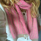 pink wool scarf on a lady 